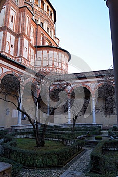 Santa Maria delle Grazie, view from the cloister in contrast of afternoon light and shadows, Milan, Italy