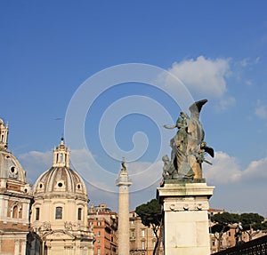 Santa Maria di Loreto church and statue in front of National Monument of Victor Emmanuel II, Rome, Italy