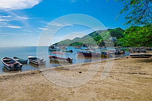 SANTA MARTA, COLOMBIA - OCTOBER 10, 2017: Beautiful outdoor view of many boats in the water in a caribean beach. Taganga