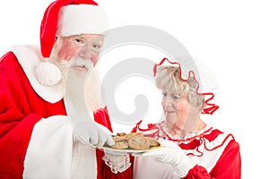 Santa and Mrs Claus with plate of cookies