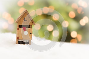Santa in An Outhouse on Snow Over and Abstract Background
