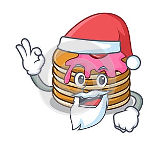 Santa pancake with strawberry mascot cartoon