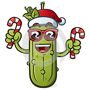 Santa Pickle Cartoon with Attitude holding Christmas Candy Canes and wearing a festive cap