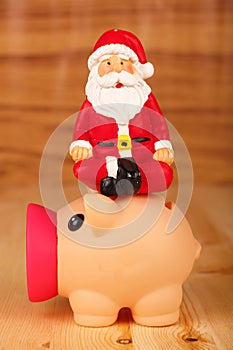 Santa with Piggy Bank.