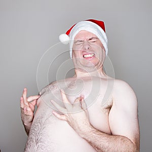 Santa pinching his nipples