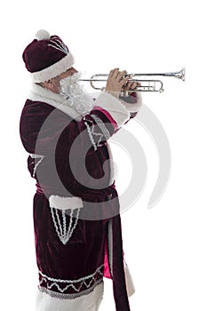 Santa plays the trumpet on a white