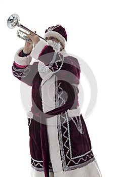 Santa plays the trumpet on a white