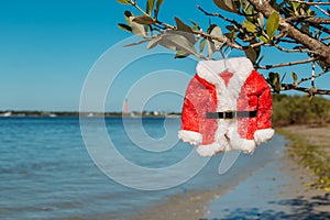 Santa`s suit hanging on a Florida beach in New Smyrna Beach