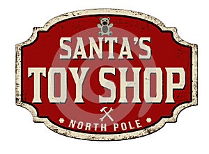 Santa`s toy shop vintage rusty metal sign photo