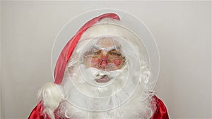 Santa say goodbye on grey background