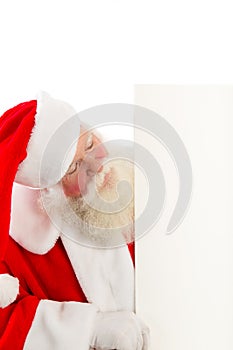 Santa with a sign to the side