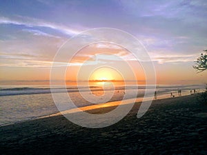 Sunset at Santa Teresa Beach photo