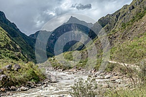 The Santa Teresa River in green lush valley. Hiking trail to Machu Picchu, Peru photo