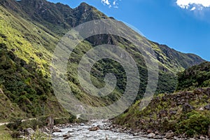 The Santa Teresa River in green lush valley. Hiking trail to Machu Picchu, Peru photo