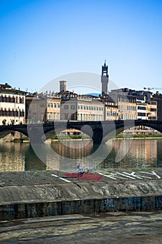 Santa Trinita Bridge Over Arno River in Florence, Italy - Iconic Cityscape with Arnolfo Tower