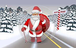 Santa walking with a bag on the road in a snowy forest