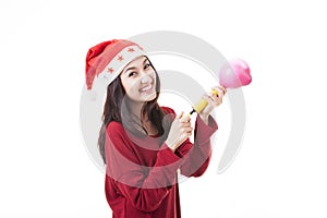 Santa woman making a balloon