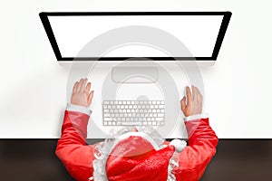 Santa work on computer with isolated screen for mockup