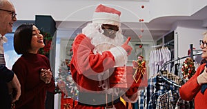 Santa worker draws raffle winner
