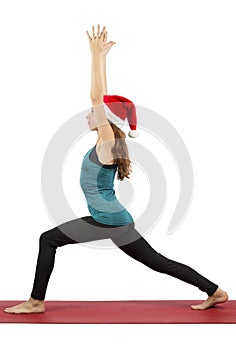 Santa yoga woman doing crescent pose