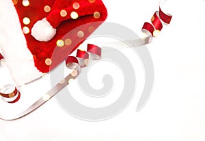 Santaclaus Christmas hat on a white background, top view. space for text. photo