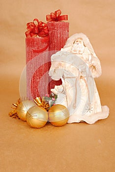 Santaclaus in the white clothes with a red candles