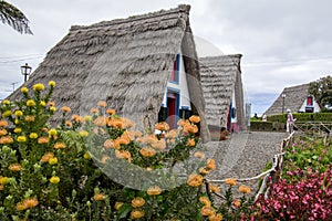 Santana, Madeira / PORTUGAL - April 19, 2017: Traditional farmhouses on Madeira island in village Santana are tourist attraction