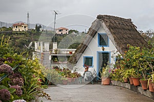 Santana, Madeira, Portugal - traditional houses on a cloudy day.