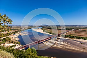 Santarem, Portugal. Ponte Dom Luis I Bridge, Tagus River and Leziria photo