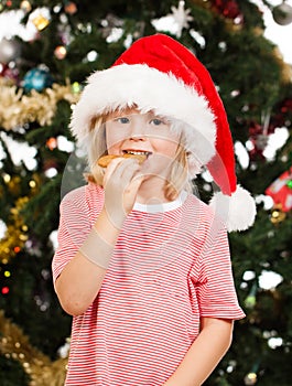 Santas helper eating gingerbread