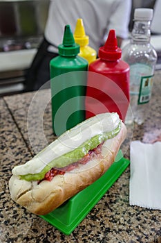 Santiago, Chile - 26 Nov, 2023: Traditional Completo Hot Dogs on sale at a snack vendor in Santiagos Plaza de Armas