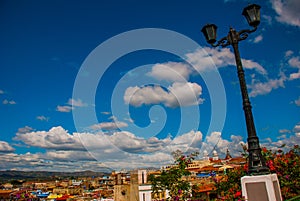 Santiago de Cuba, Cuba: Street lamp. Top view of the city, view of the house and the Catholic Cathedral