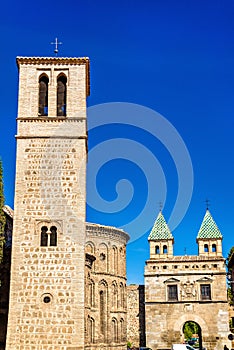 Santiago del Arrabal Church and Puerta de Bisagra Nueva Gate in Toledo, Spain photo