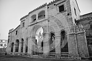Santo Domingo, Dominican Republic. Catedral Primaria de America located in Columbus Park. Black and white version photo
