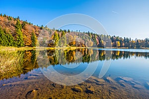 Santo lake of Cembra in autumn time, Trento province, Italy