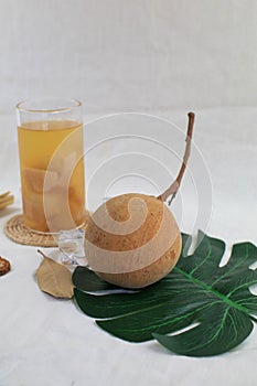 Santol drink has sour taste and the middle of santol is sweeter. It is very famous fruit of THAILAND.