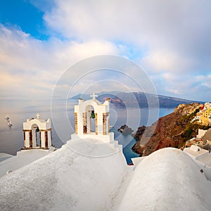 Santorini, Greece. Conceptual composition of the famous architecture of the island of Santorini. White arches of bells and blue