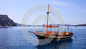 Santorini island, Greece - Boat anchored near Nea Kameni island