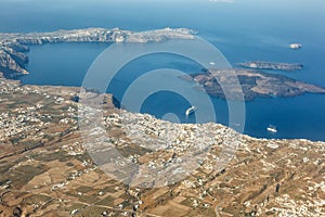 Santorini island holidays in Greece travel traveling Fira Thera town Mediterranean Sea aerial photo view Santorin