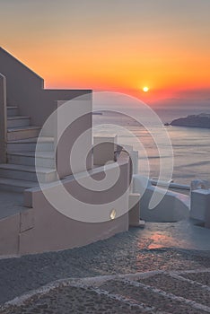 Santorini island at sunset, typical white architecture, caldera view, Imerovigli, Greece, travel background