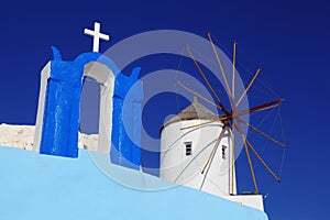 Santorini with windmill in Oia, Greece