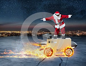 Sants Claus and super fast delivery of package service with box like a rocket.