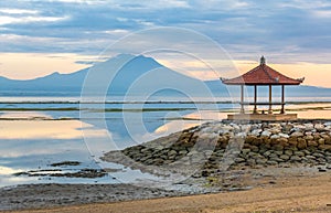 Sanur beach and Mount Agung volcano at sunrise, Bali, Indonesia