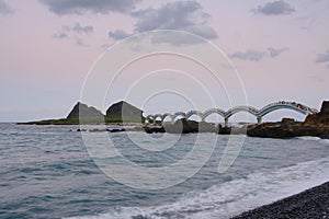 Sanxiantai Arch Bridge at dusk photo