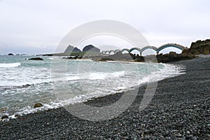 Sanxiantai beach at cloudy day photo