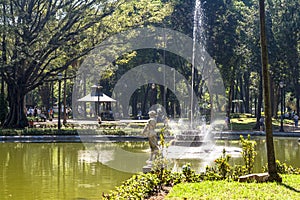 People on Luz Public Park in downtowns Sao Paulo. This is the city's first public park