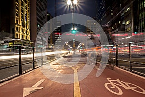 Bicycle path in Paulista Avenue at night. This is one of the most important thoroughfares of the city of Sao Paulo