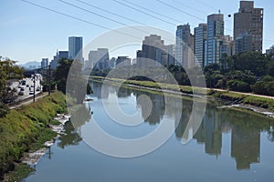 Sao Paulo/Brazil: Tiete river, cityscape and buildings