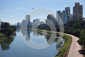 Sao Paulo/Brazil: Tiete river, cityscape and buildings