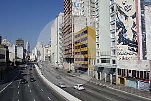 Sao Paulo cityscape: vehicles traffic, city architecture, Prestes Maia avenue